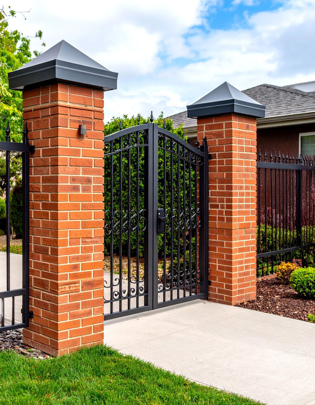 Airy Brick and Wrought Iron Fence - 20 Front Yard Brick Fence Ideas