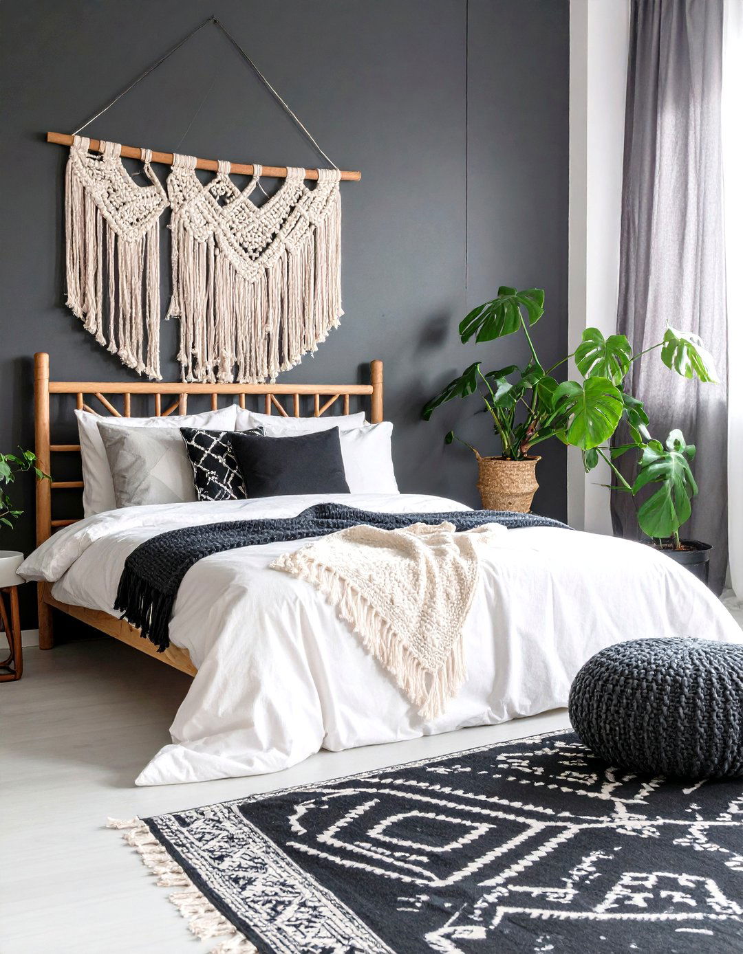 Boho Chic Macrame Pops Against Black Walls - 20 Feminine Black and White Bedroom Ideas