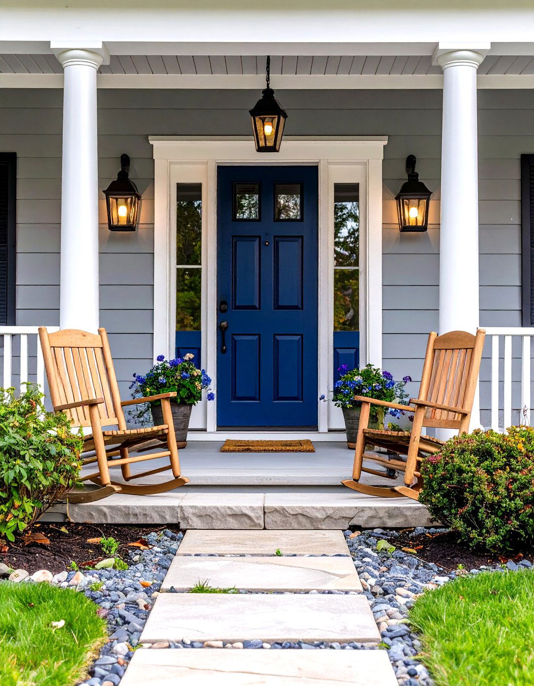 Classic Navy Door with White Columns on Grey Porch - 20 Grey House With Blue Door Ideas