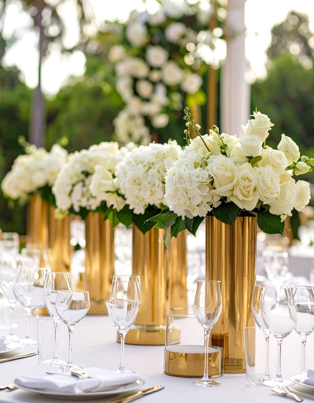 Classic White Blooms on Gold Stands - 20 Tall Wedding Centerpiece Ideas