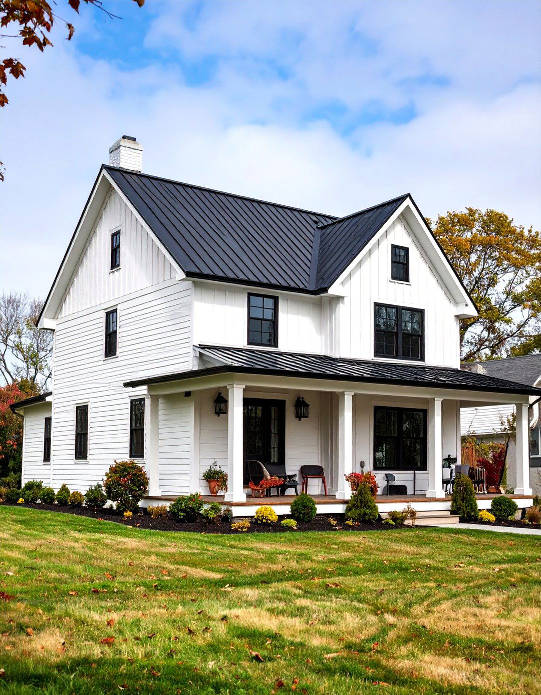 Classic White Modern Farmhouse Exterior with Black Metal Roof - 20 Modern Farmhouse Exterior