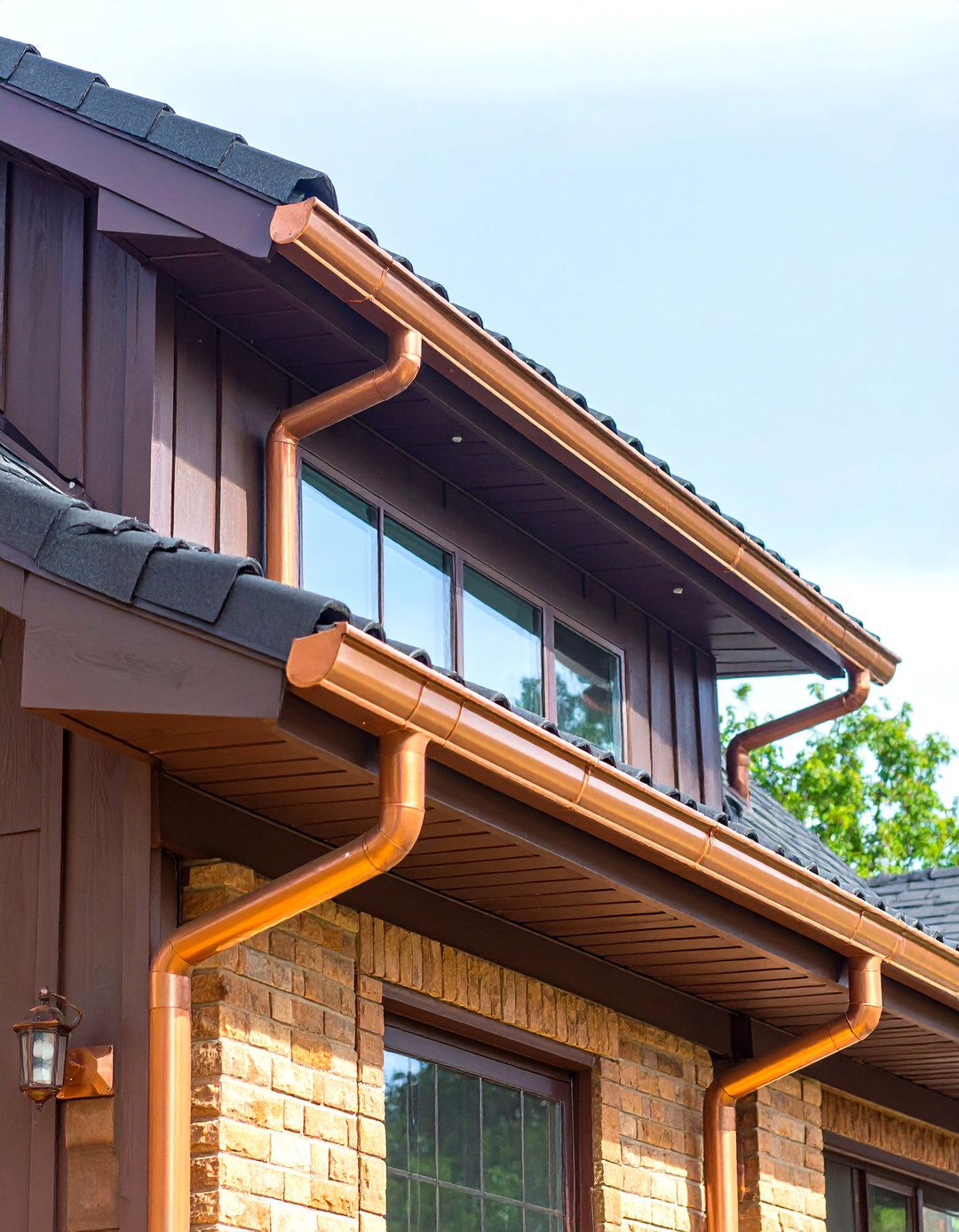 Copper Gutters Enrich a Dark Brown House Exterior - 20 Dark Brown House Exterior Ideas