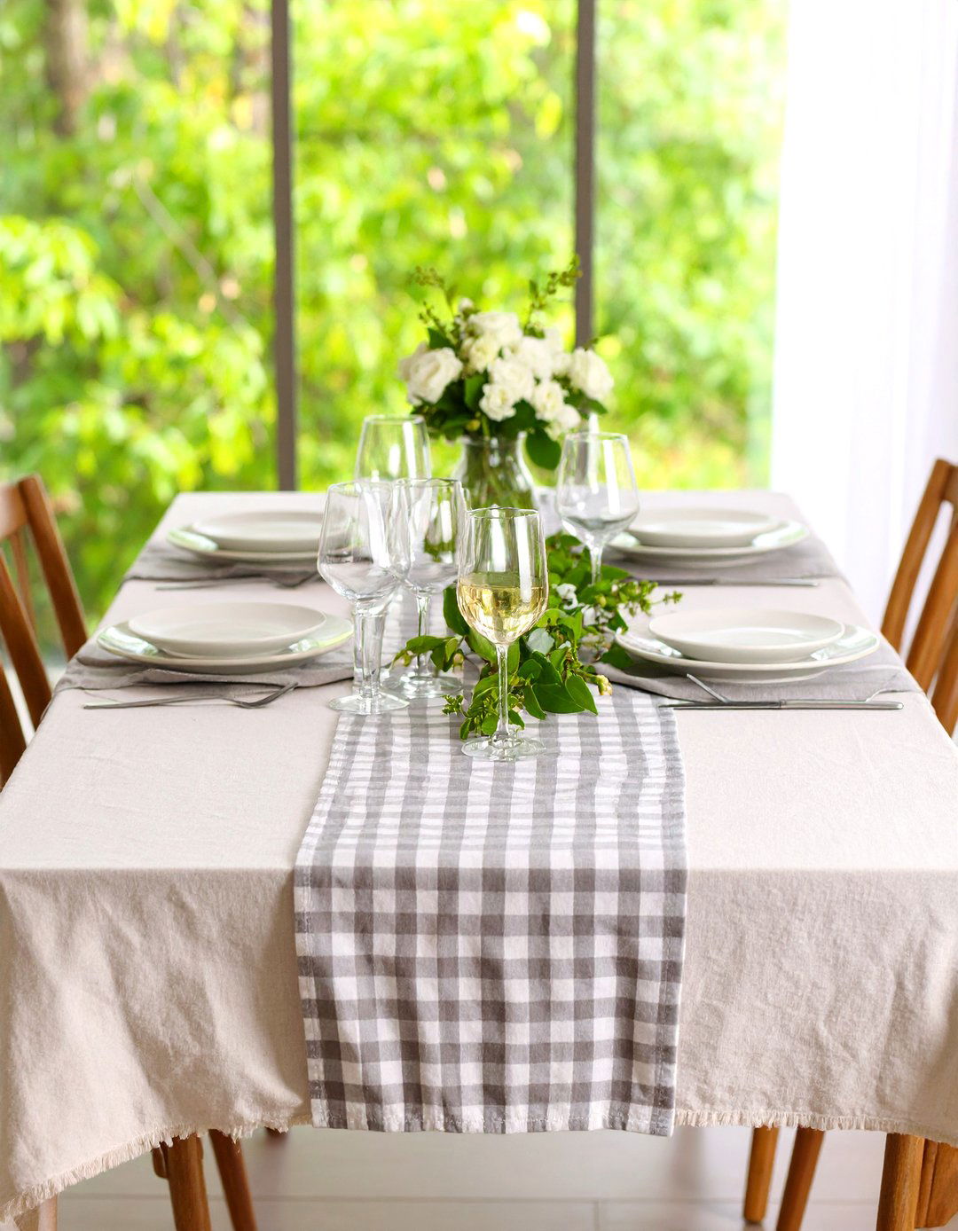 Layered Tablecloths Add Depth to the Dining Table - 20 Dining Room Table Decor Ideas