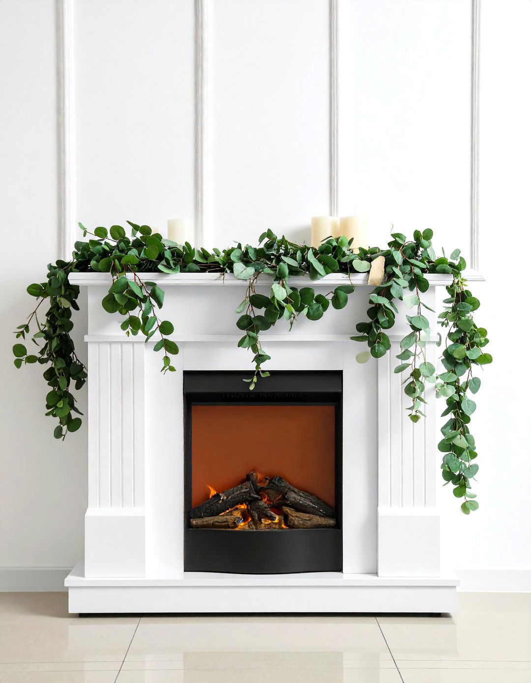 Lush Greenery Draped Across the Fireplace - 20 Fireplace Decor Ideas