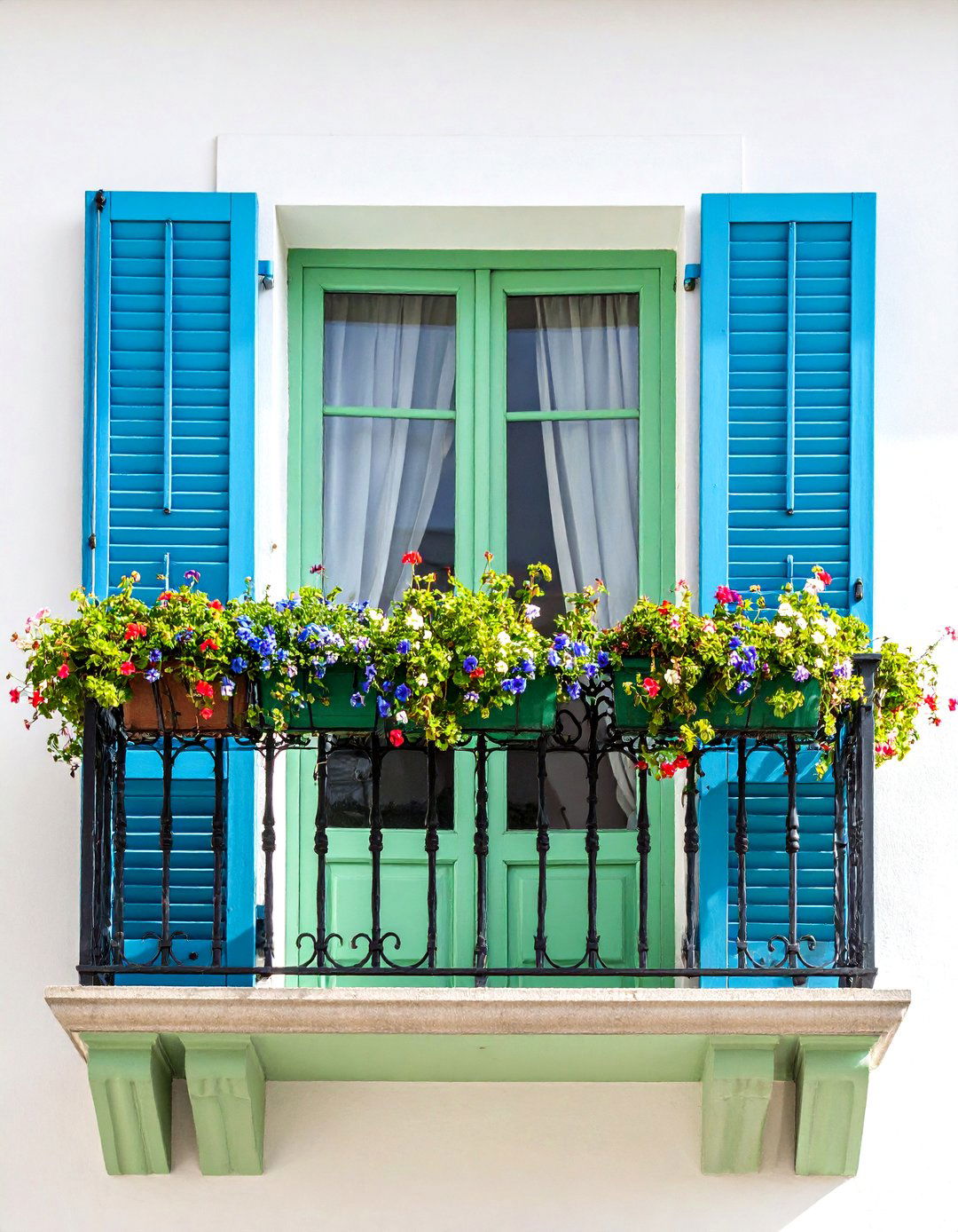 Pastel Shutters Framing a French Balcony - 20 French Balcony Ideas