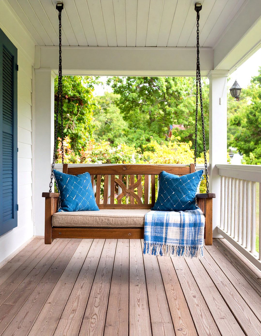 Rustic Cedar Front Porch Swing with Farmhouse Charm - 20 Front Porch Swing Ideas