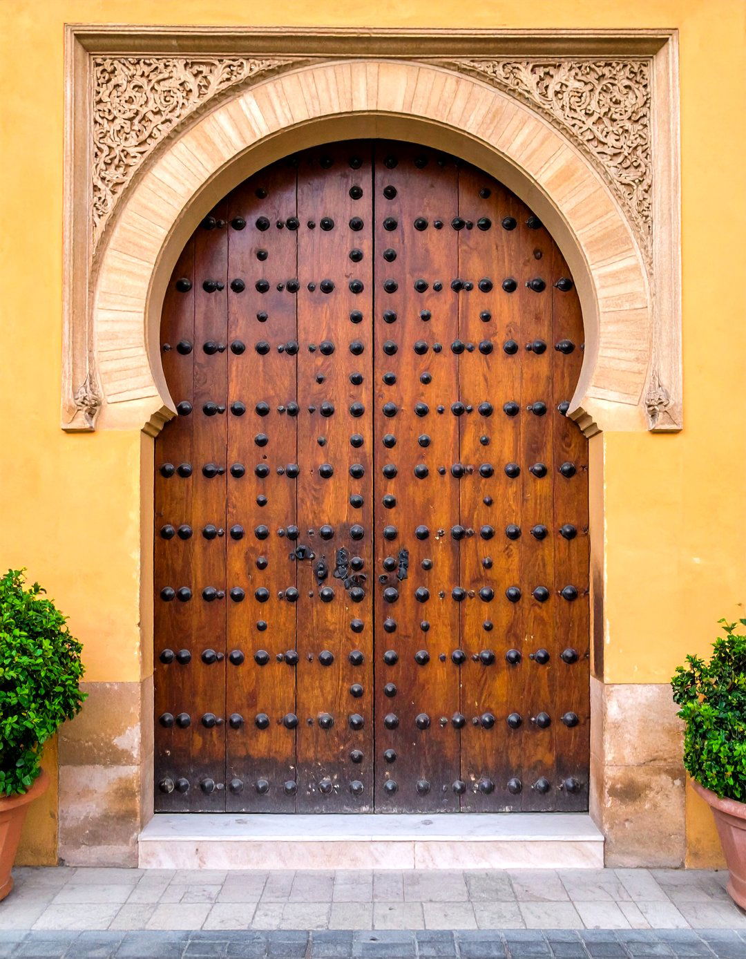 Rustic Metal Studded Doors - 20 Spanish Style Front Door Ideas