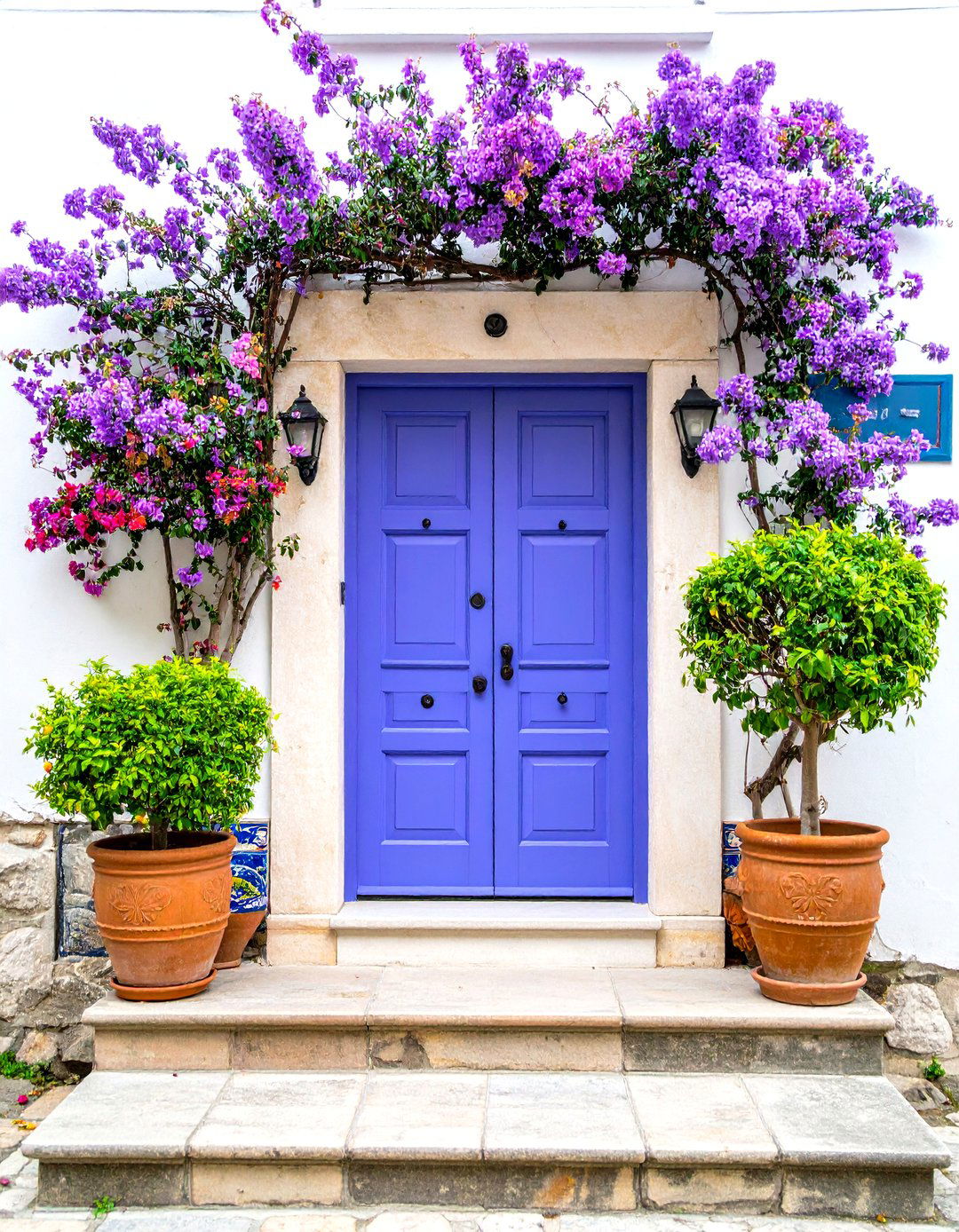 Spanish Colonial Lavender Front Door with Tile Accents - 20 Lavender Front Door Ideas