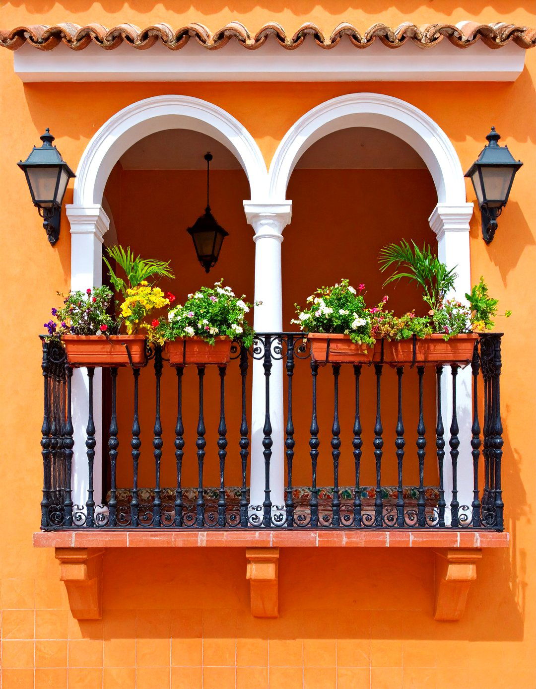 Spanish Style Balcony Over Garage with Tile Accents - 20 Balcony Over Garage Ideas