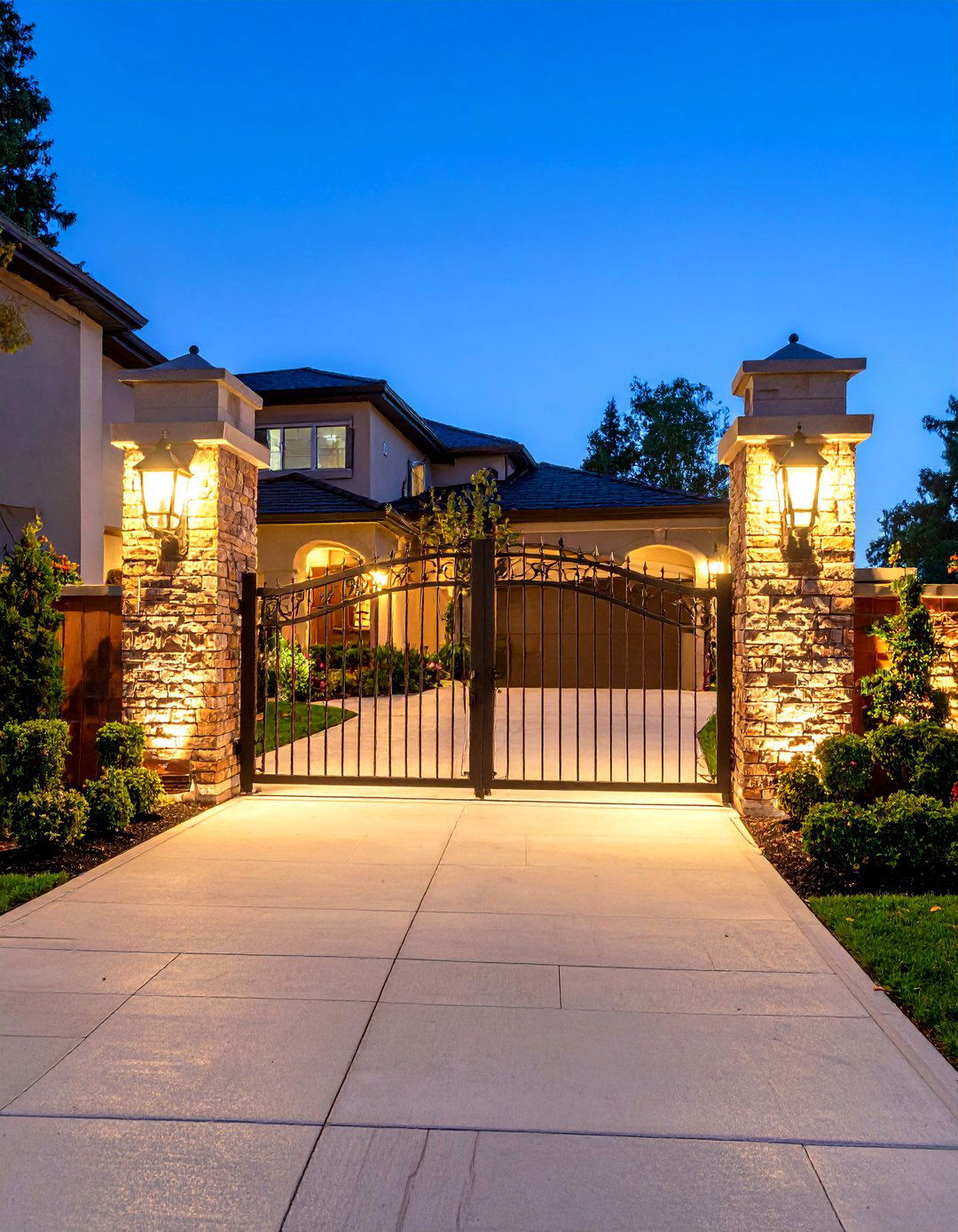 Stone Pillar Driveway Entrance with Integrated Lighting - 20 driveway entrance ideas