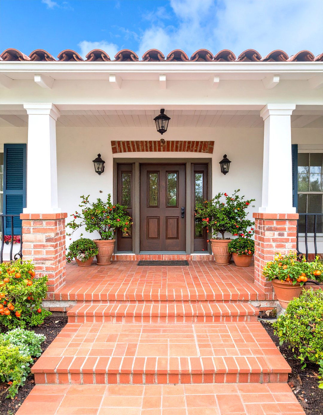 Terracotta Tile and Wrought Iron Spanish Style Front Porch - 20 spanish style front porch ideas