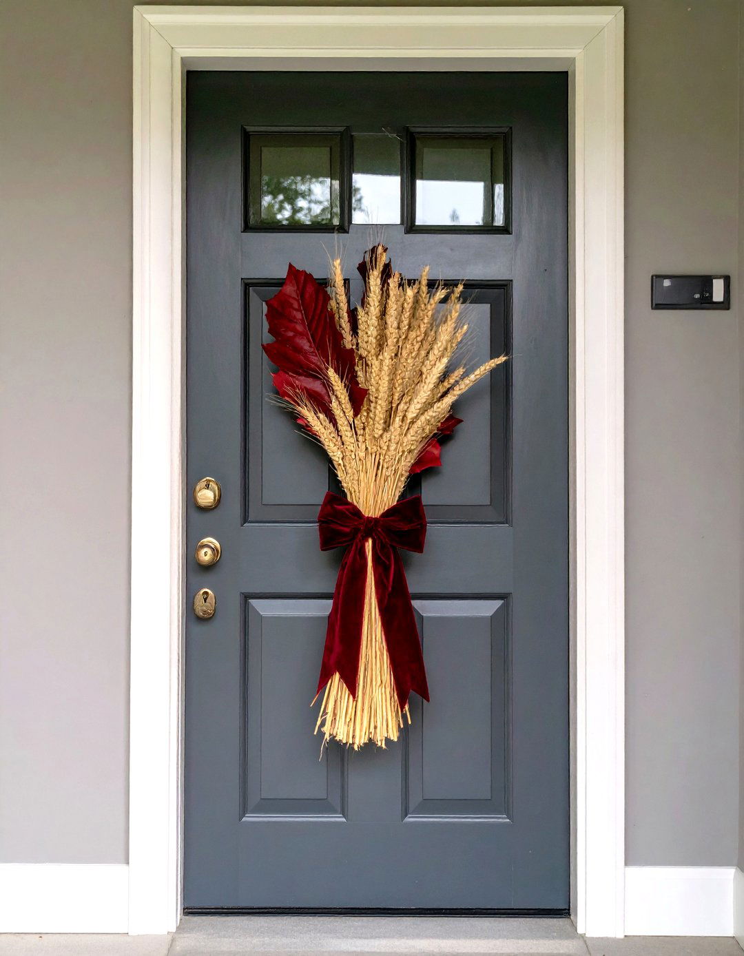 Wheat Sheaf Door Swag as Minimalist Front Door Fall Decor - 20 Front Door Fall Decor Ideas