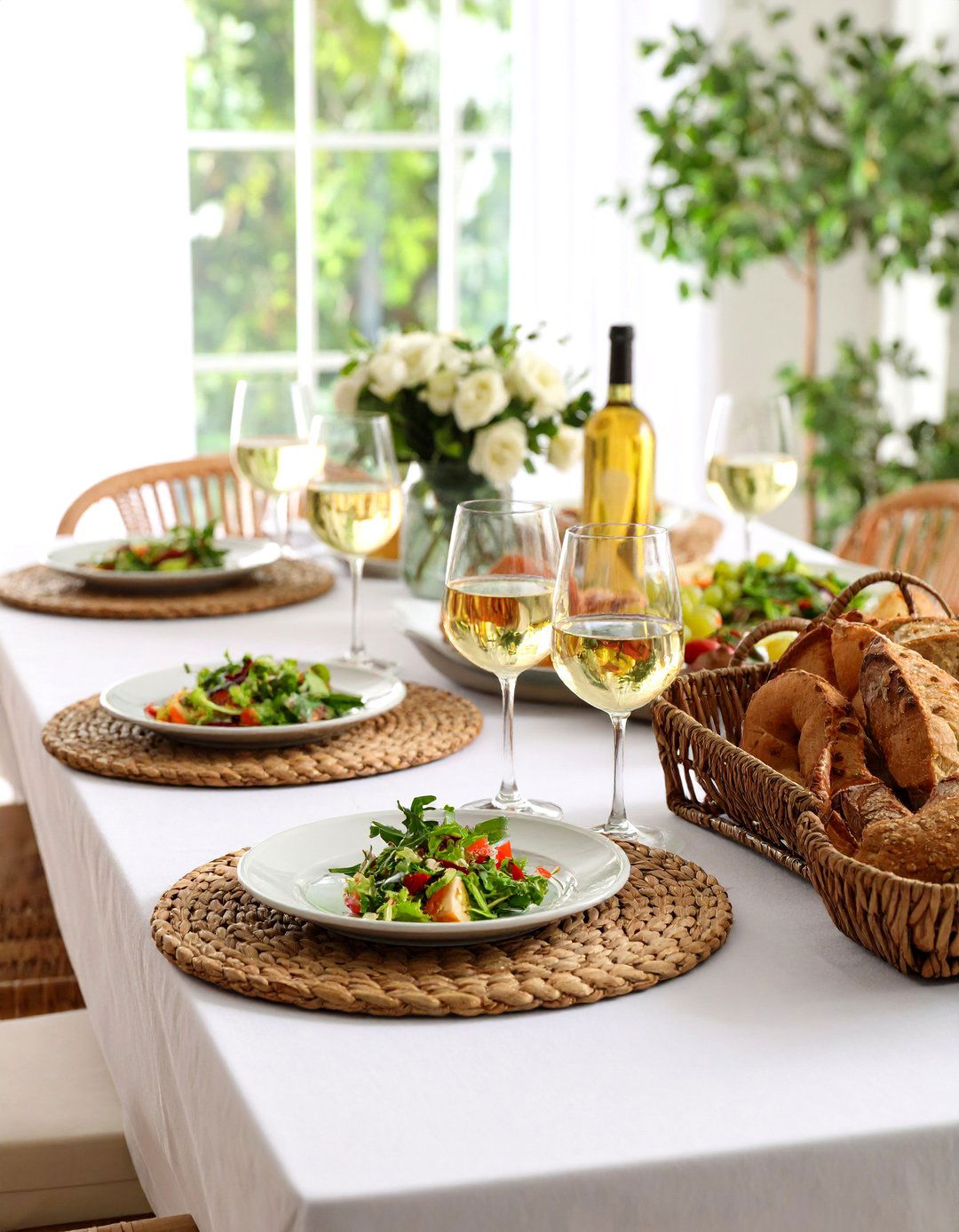 Wicker and Rattan Layers Add Tactile Warmth to the Dining Table - 20 Dining Room Table Decor Ideas
