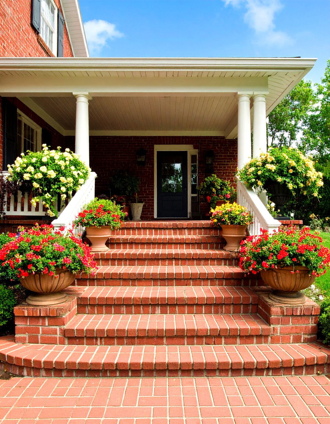 Wide Brick Landing Steps for Grand Entrances - 20 Brick Front Steps Design Ideas