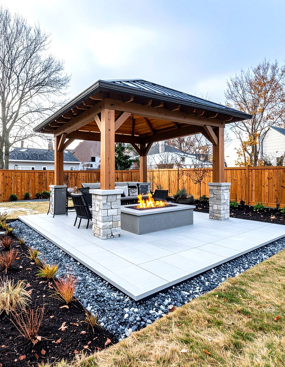 Winter Ready Heated Stamped Concrete Patio with Covered Fire Pit Alcove - 20 stamped concrete patio with fire pit ideas